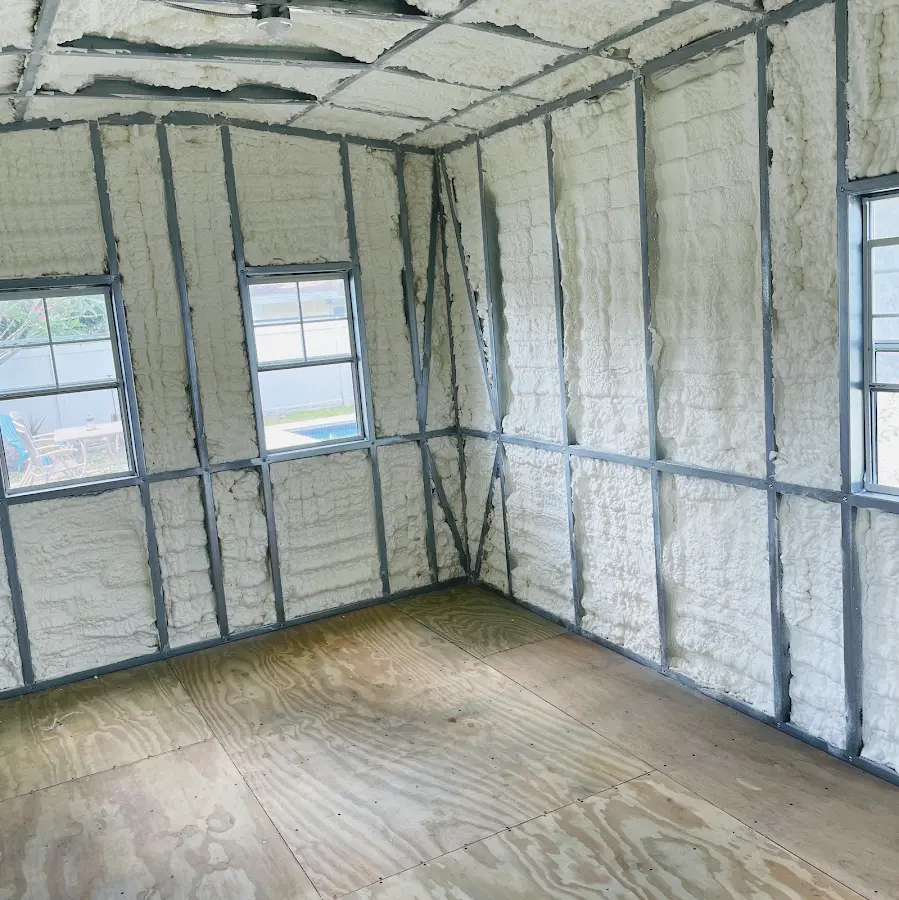 Closed-cell spray foam insulation applied to wall cavities in a residential project in South Holland